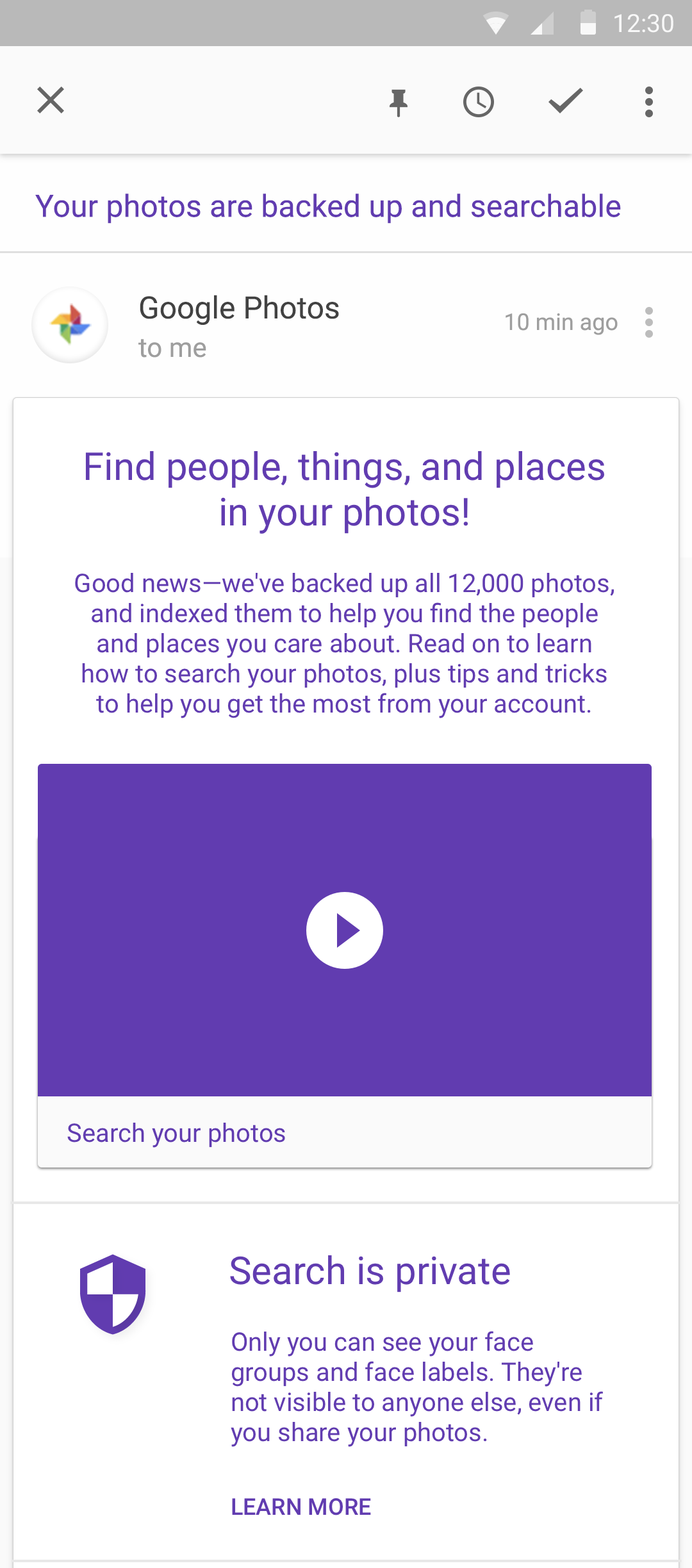 The Google Photos welcome email visual design: Your photos are backed up and searchable, with a how-to-search video and a note that search is private
